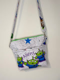 crossbody of three little aliens