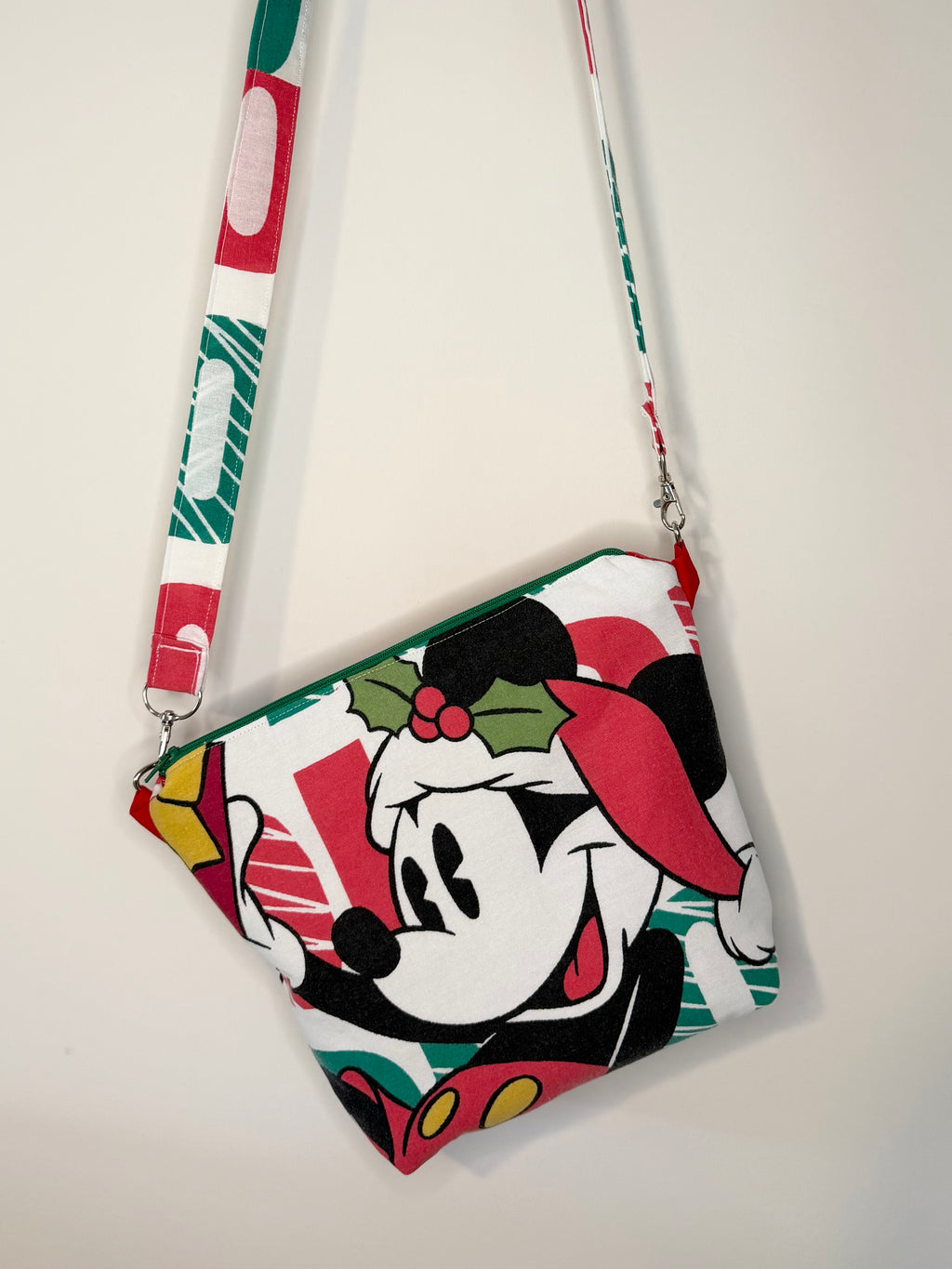 crossbody of mouse with christmas background