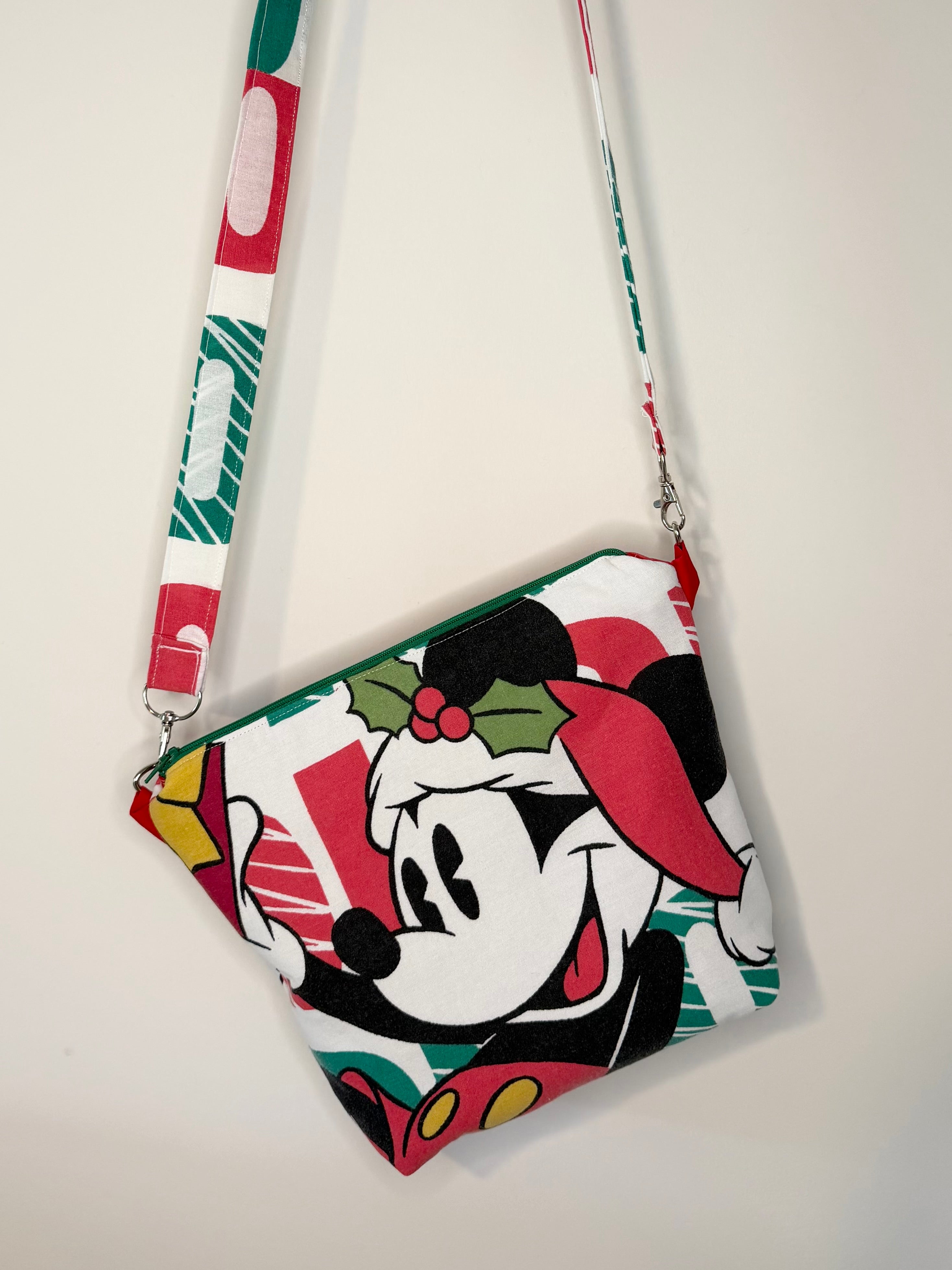 crossbody of mouse with christmas background