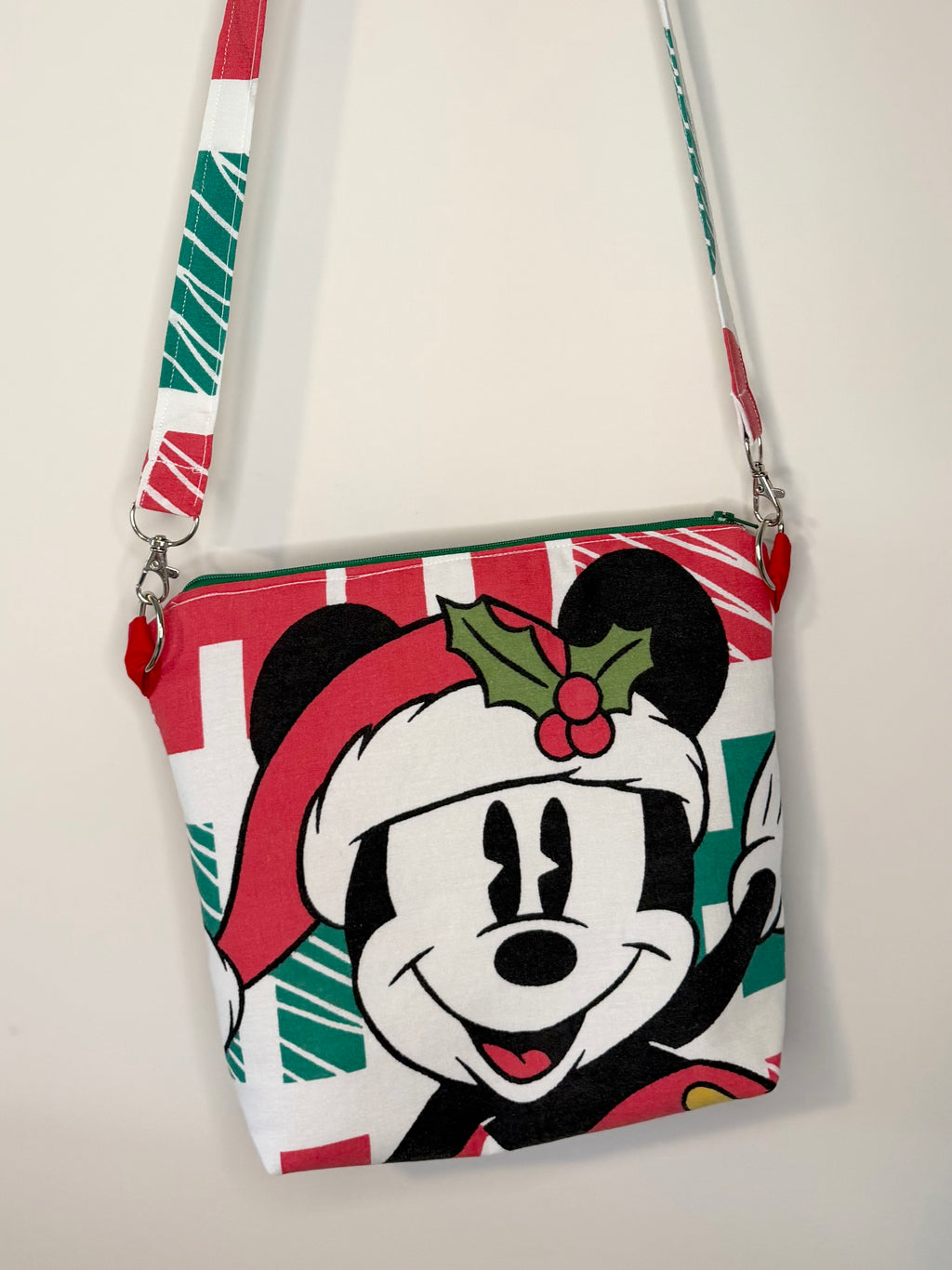 crossbody of mouse with christmas background