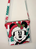 crossbody of mouse with christmas background